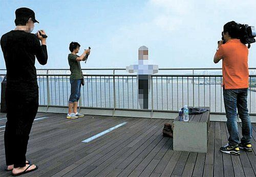 韩国电视台全程拍摄男子投江自尽引争议(图)